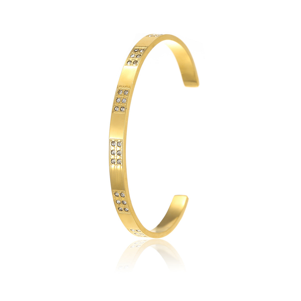 Brazalete abierto de acero de titanio con diseño geométrico, inspirado en el océano, con incrustaciones de pedrería y acabado chapado