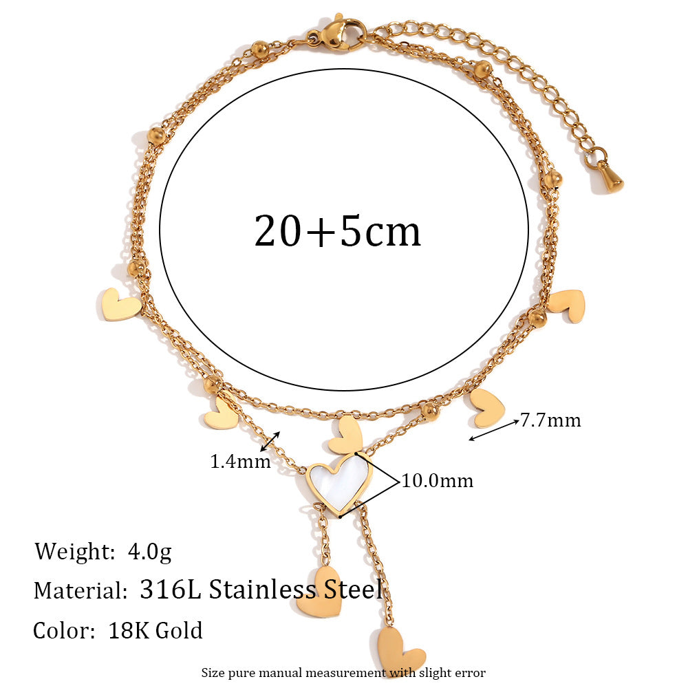 Tobillera Minimalista de Doble Capa con Cadena de Acero Inoxidable, Cuentas Espaciadoras en Forma de Corazón Bañadas en Oro de 18K, Abalone Blanco y Detalles de Borla