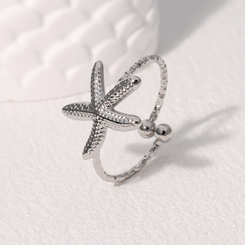 Anello aperto a stella marina minimalista in acciaio inossidabile da donna con finitura placcata