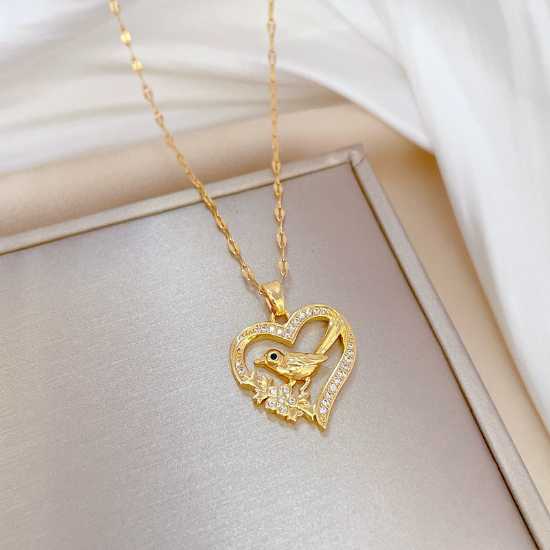 Luxury Rhinestone-Encrusted Titanium Steel Heart-Shaped Bird Pendant Necklace for Women, Adjustable Length, Elegant Clavicle Chain for Wedding and Formal Events