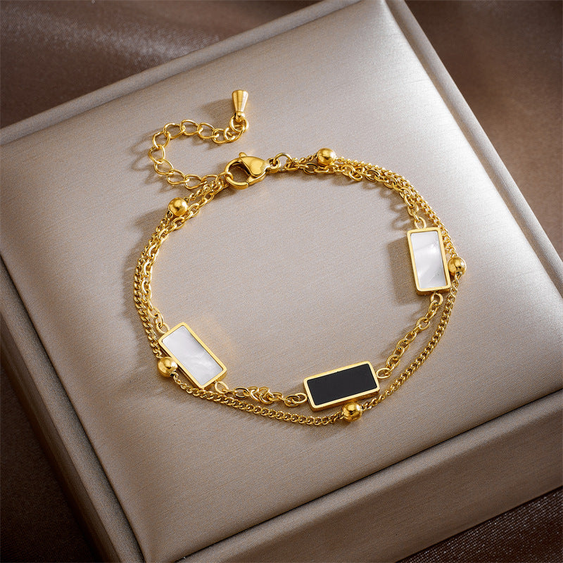 Minimalist Vintage-Inspired Double-Layer Bracelet with Stainless Steel Chain, Pearl Round Pendants, Star and Butterfly Charms