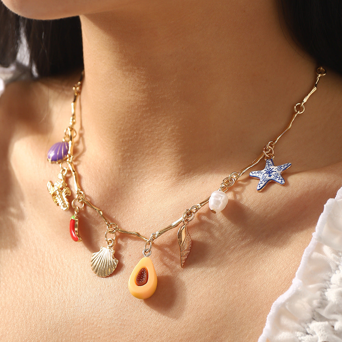 Collar de mujer estilo bohemio con cuentas en forma de corazón y estrella de mar, con esmalte y colgante de aleación en cadena estándar
