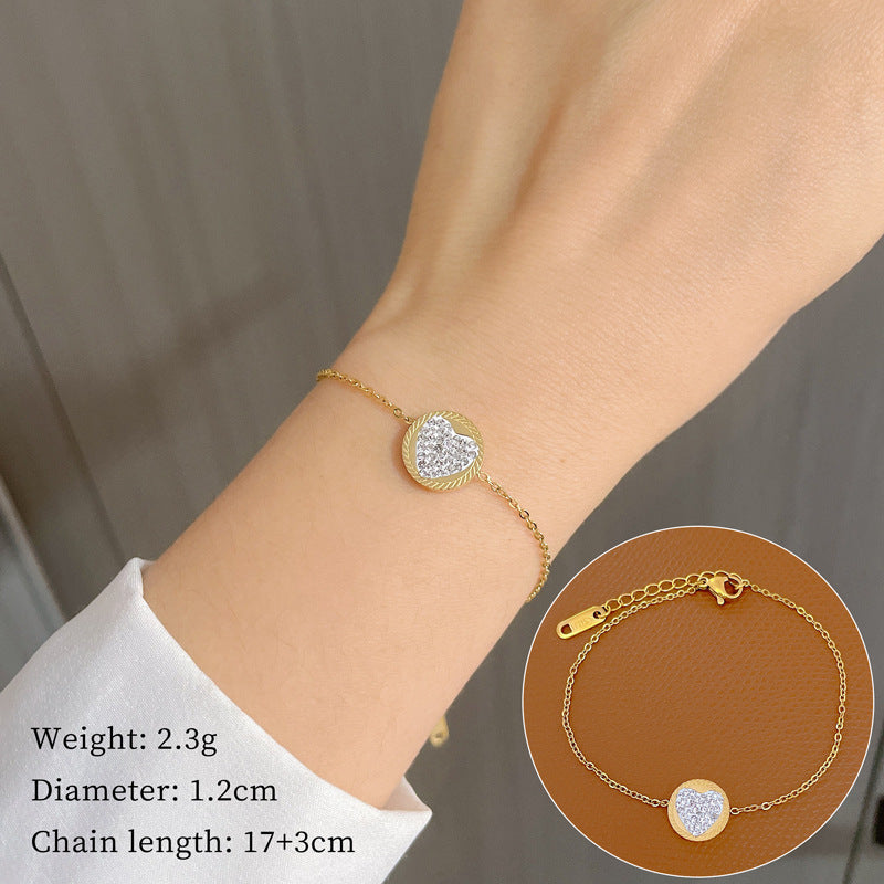 Bracciale da donna in acciaio al titanio a forma di cuore tondo stile vintage con intarsio di strass