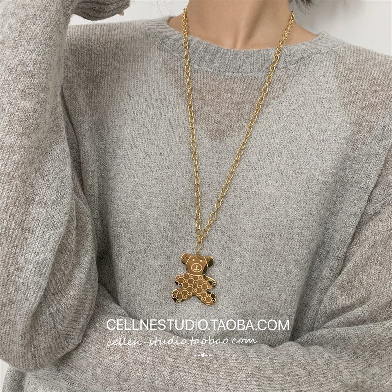 Collana con ciondolo a orso minimalista in acciaio al titanio con finitura placcata, catena a onda d'acqua, design geometrico, accessorio di moda unisex