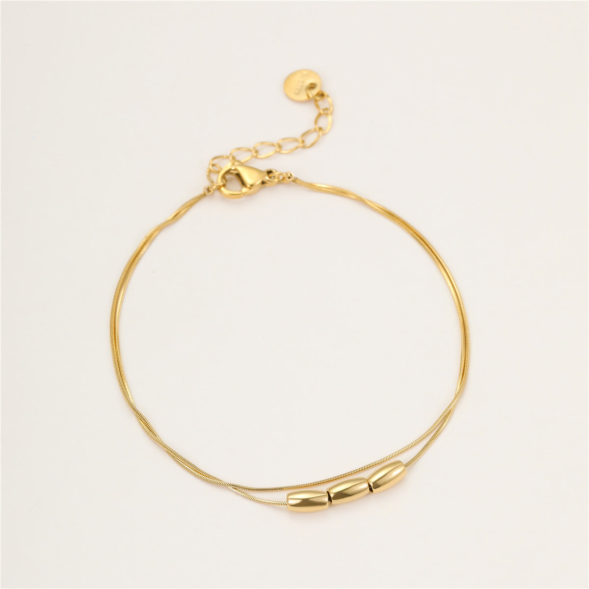 Collana pendente con perline geometriche in acciaio inossidabile stile minimalista da donna con finitura placcata e delicato design a doppia catena sulla clavicola