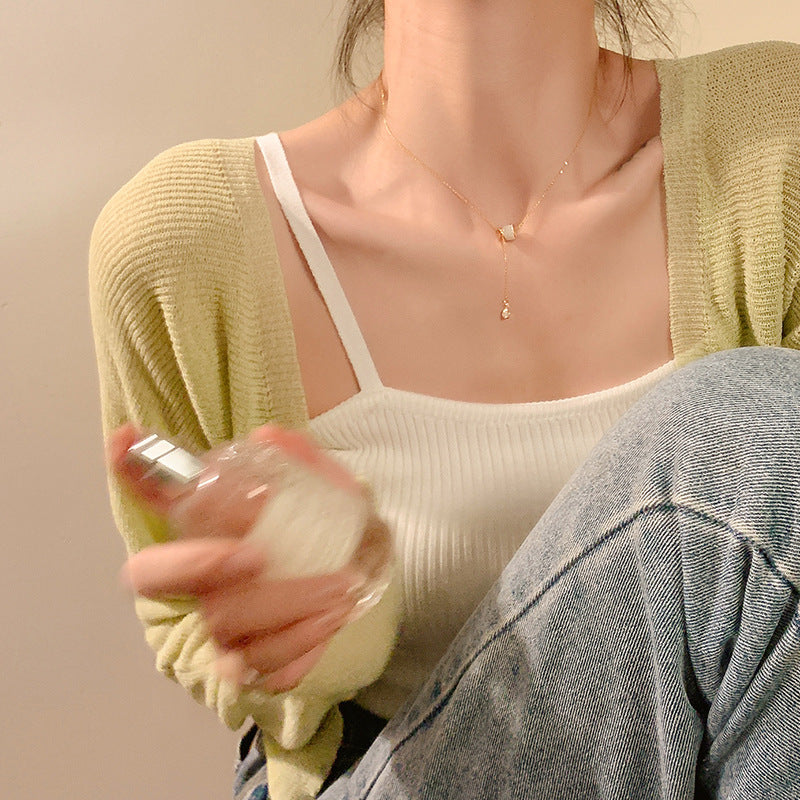 Collana con pendente in acciaio al titanio geometrico stile naturale con pietra occhio di gatto e nappa per donna
