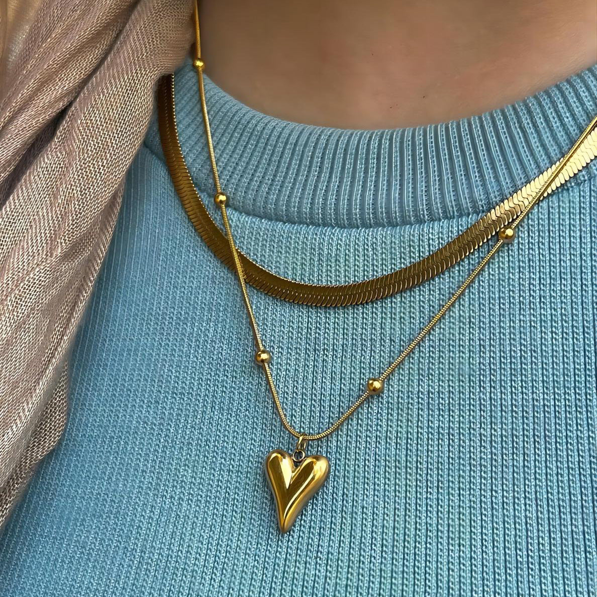 Collar colgante de corazón doble minimalista en acero inoxidable con acabado chapado para mujer y hombre