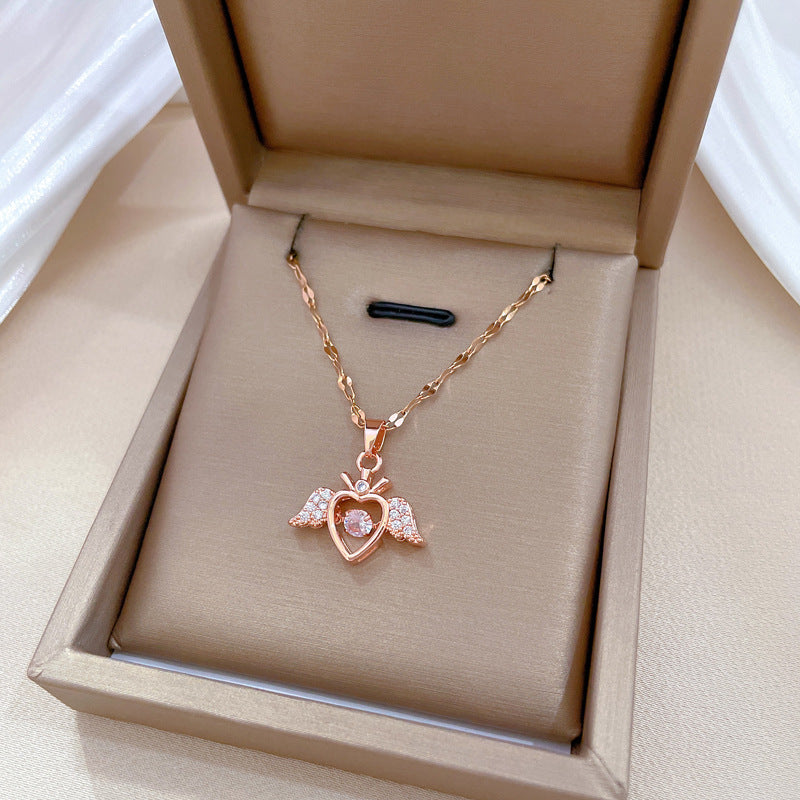 Elegante collana pendente a forma di ala d'angelo per donna, catena in acciaio inossidabile con accenti di strass, look lussuoso e leggero