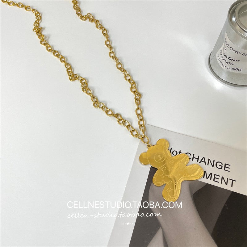 Collana con ciondolo a orso minimalista in acciaio al titanio con finitura placcata, catena a onda d'acqua, design geometrico, accessorio di moda unisex