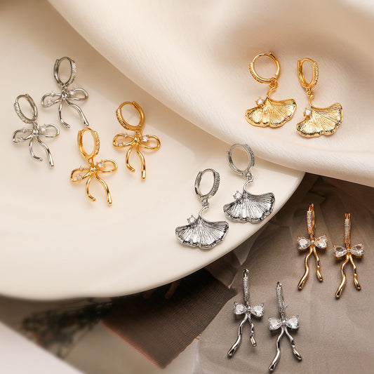 Orecchini da donna minimalisti in rame a forma di fiocco, placcati in oro vero e con intarsio in zircone