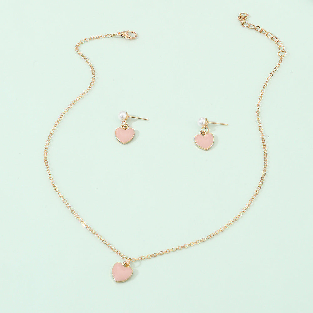 Set di collane minimaliste in lega a forma di cuore rosa per ragazze con catena a onda d'acqua