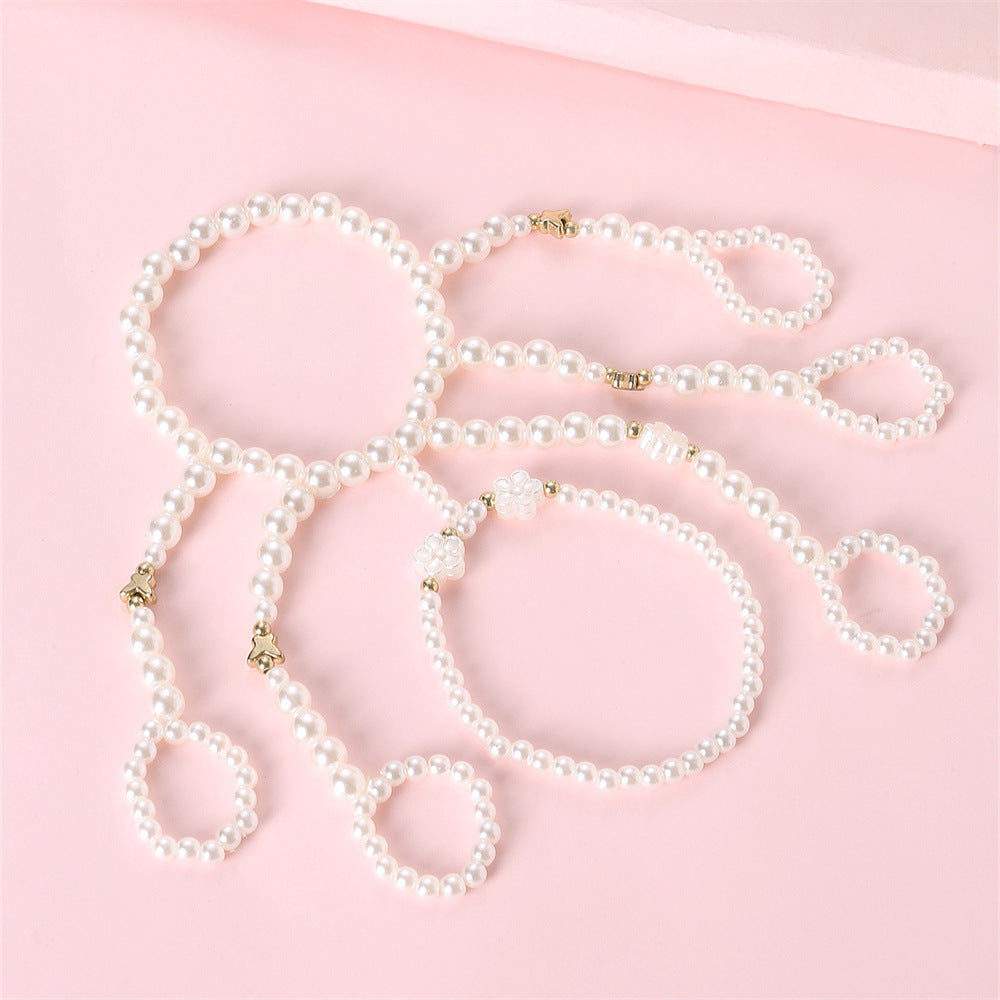 Pulsera Dulce Floral con Perlas para Niñas con Dijes de Flores de Resina y Delicados Acentos de Estrellas