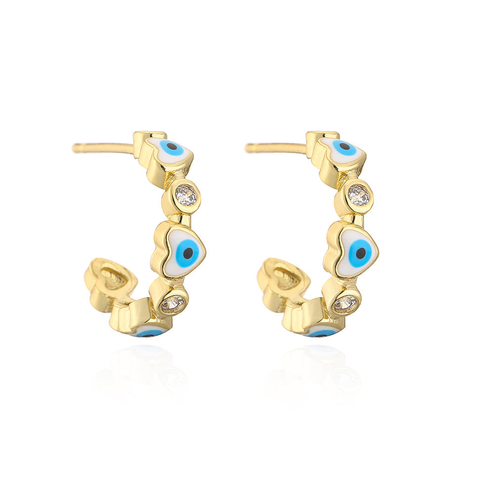 Geometric Style Copper Earrings with 18K Gold Plating and Micro-Paved Zirconia Heart-Eye C-Shaped Design for Women