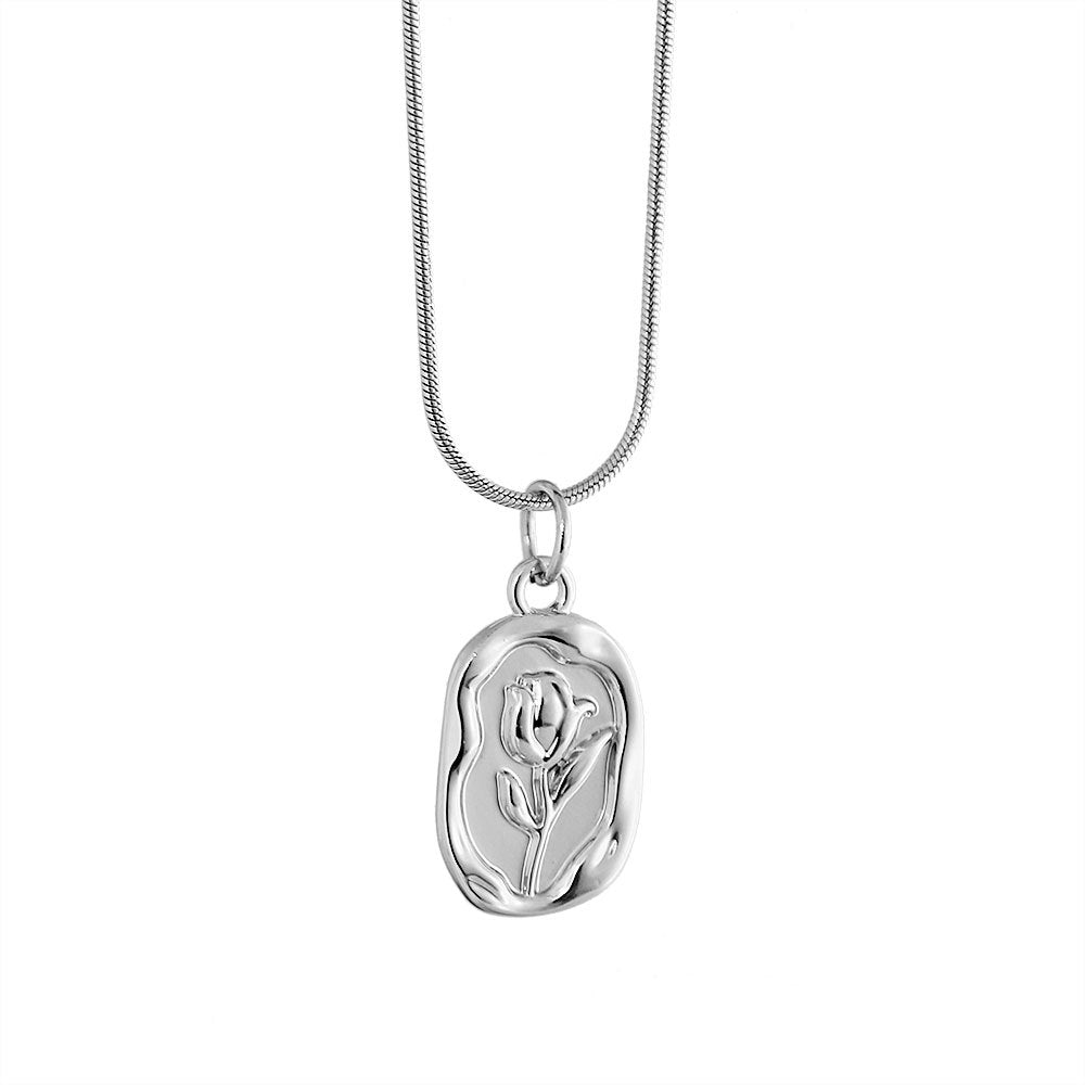 Collana pendente vintage a tulipano e rosa francesi in acciaio al titanio con placcatura in oro 18 carati su catena a serpente