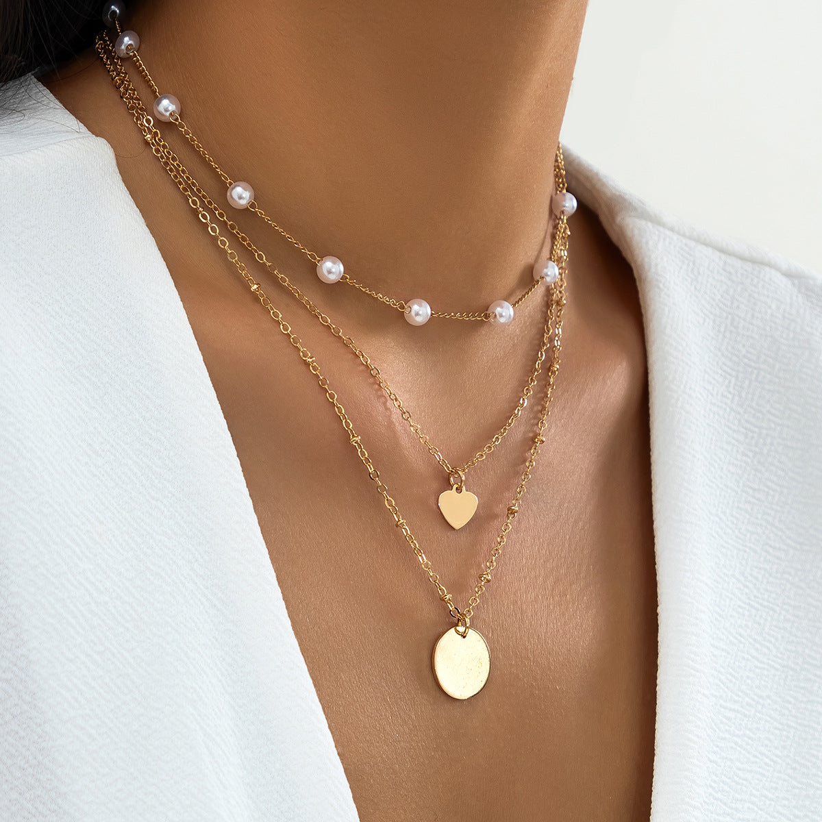 Set di collana girocollo geometrica minimalista con disco, catena in metallo placcato e accenti di perle imitate, da donna