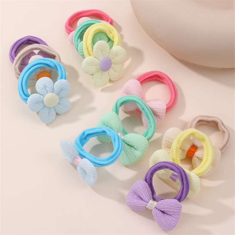Fermacoda colorato con fiocco a macaron per bambine, con elevata elasticità e grazioso design a fumetto