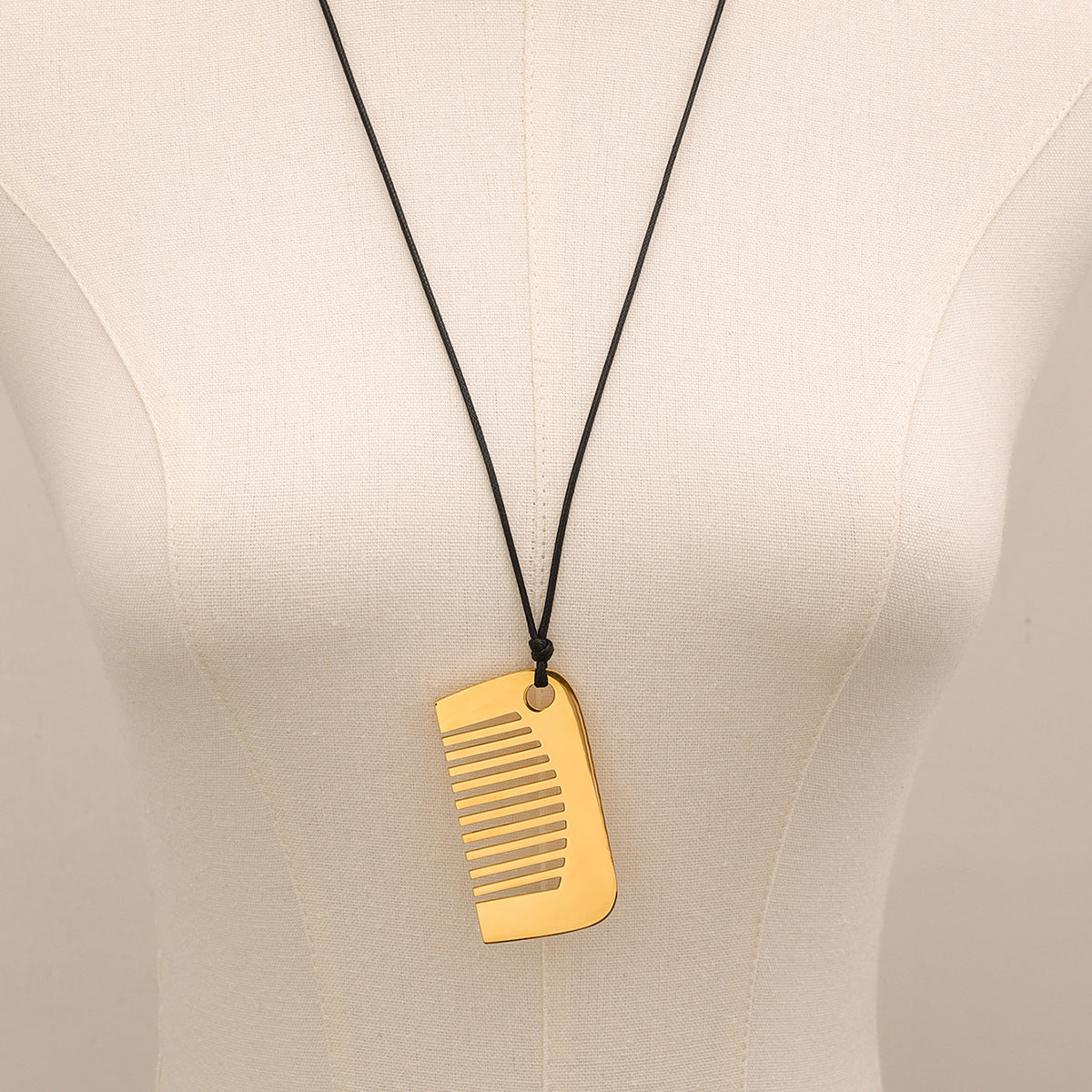 Collana con ciondolo geometrico in acciaio inossidabile con ciondolo in titanio, catena per maglione minimalista galvanizzata da donna