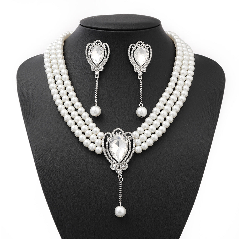 Minimalist Snowflake Pearl Necklace Set with Alloy Pendant and Rhinestone Accents for Women Includes O-Chain Necklace Earrings and Bracelet