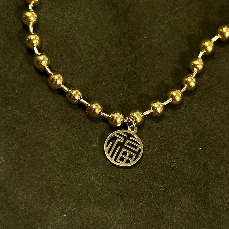 Original Design Leaf-Shaped Titanium Steel Bracelet with 18K Gold Plating for Women, Hypoallergenic Round Bead Wristband