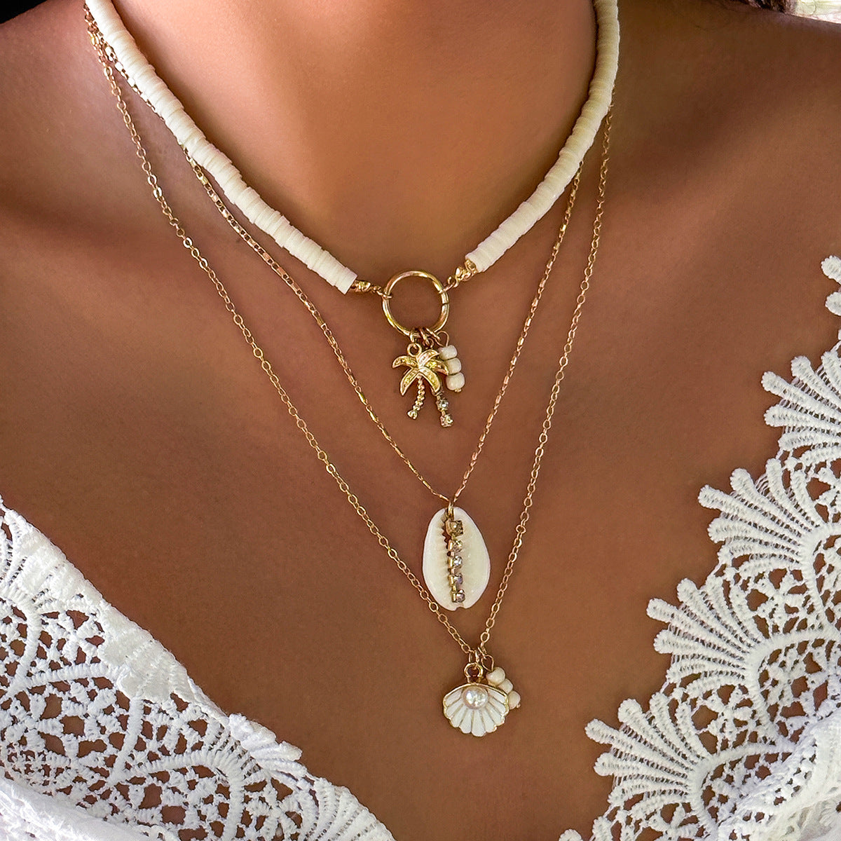 Collana con Pendente Guscio Marino e Stella Marina Boho Chic con Dettagli Nappa, Collana in Lega Multistrato con Finitura Placcata per Donne