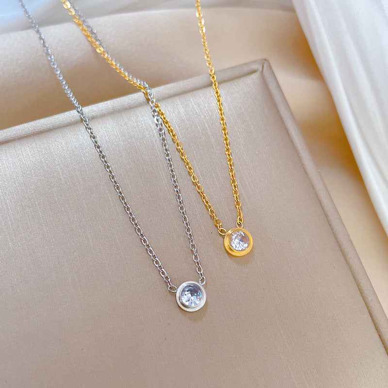 Collana girocollo minimalista in acciaio al titanio con strass, ciondolo floreale geometrico