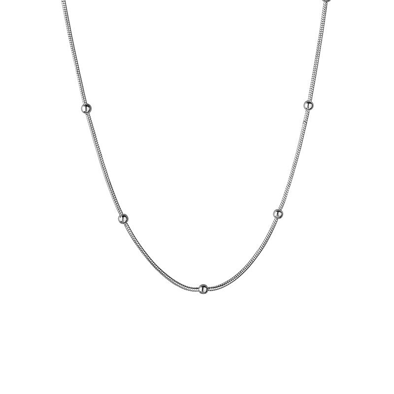 Elegante collana girocollo da donna a catena serpente in acciaio al titanio placcato oro 18 carati con perline geometriche