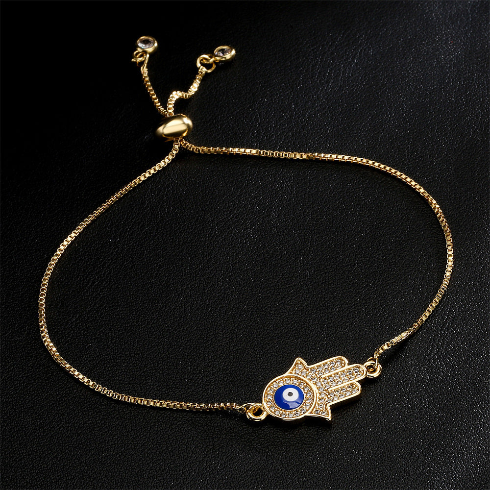 Exotic Geometric Evil Eye Hand Chain in Gold-Plated Copper with Micro-Pave Zirconia