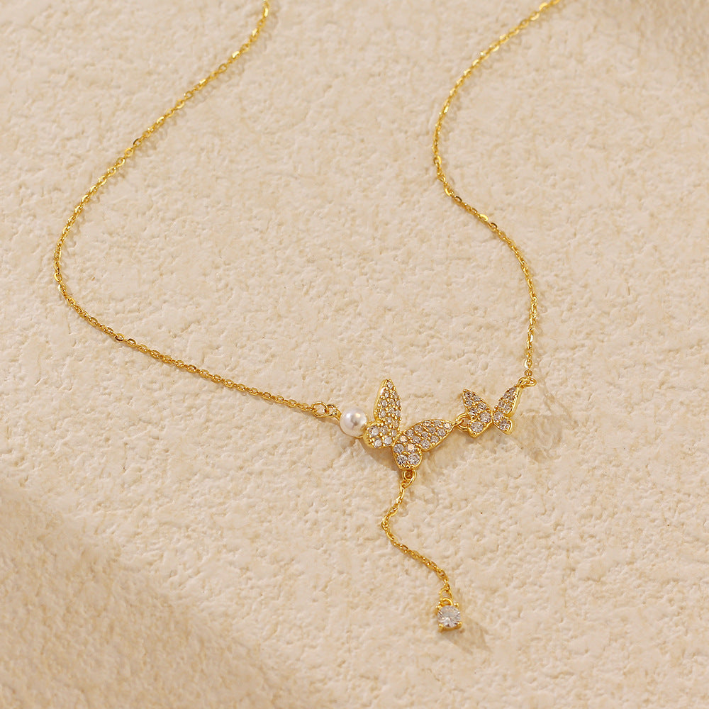 Elegante collana a farfalla in argento sterling 925 con zirconi cubici e nappe di perle a catena forzata da donna