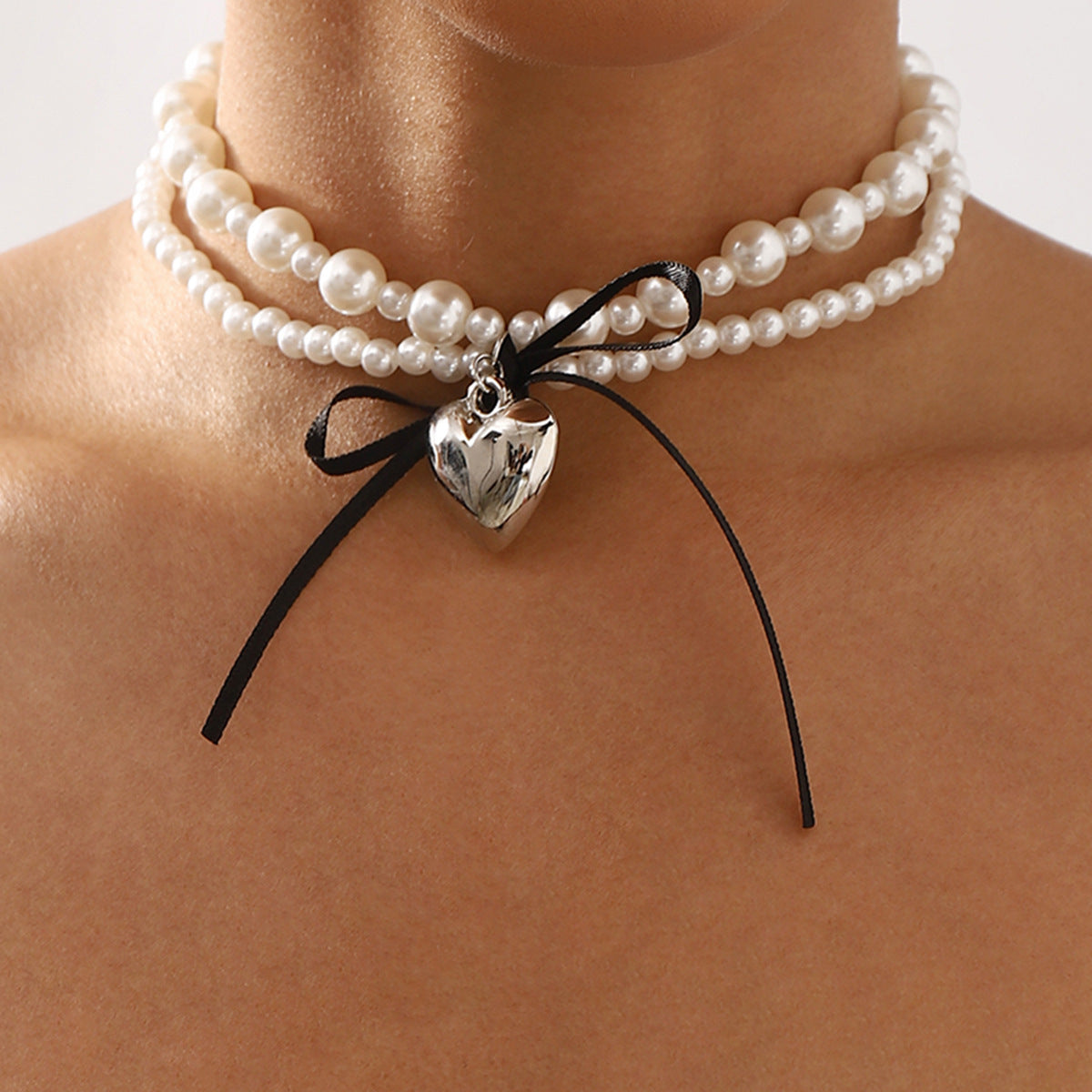 Sweet and Edgy Heart-Shaped Imitation Pearl Pendant Necklace with Satin Ribbon Bow and Double-Layer Design for Women