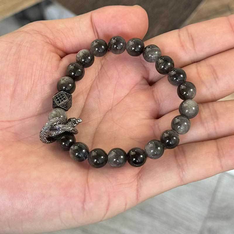 Bracciale Geometrico con Perline di Ossidiana Nera, Montatura in Rame e Accenti di Zirconi, Accessorio Moda Unisex per Donna e Uomo