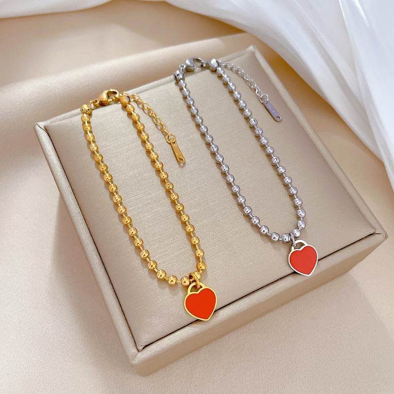 Bracciale da donna vintage bohémien a forma di cuore in acciaio al titanio placcato oro con texture ondulata