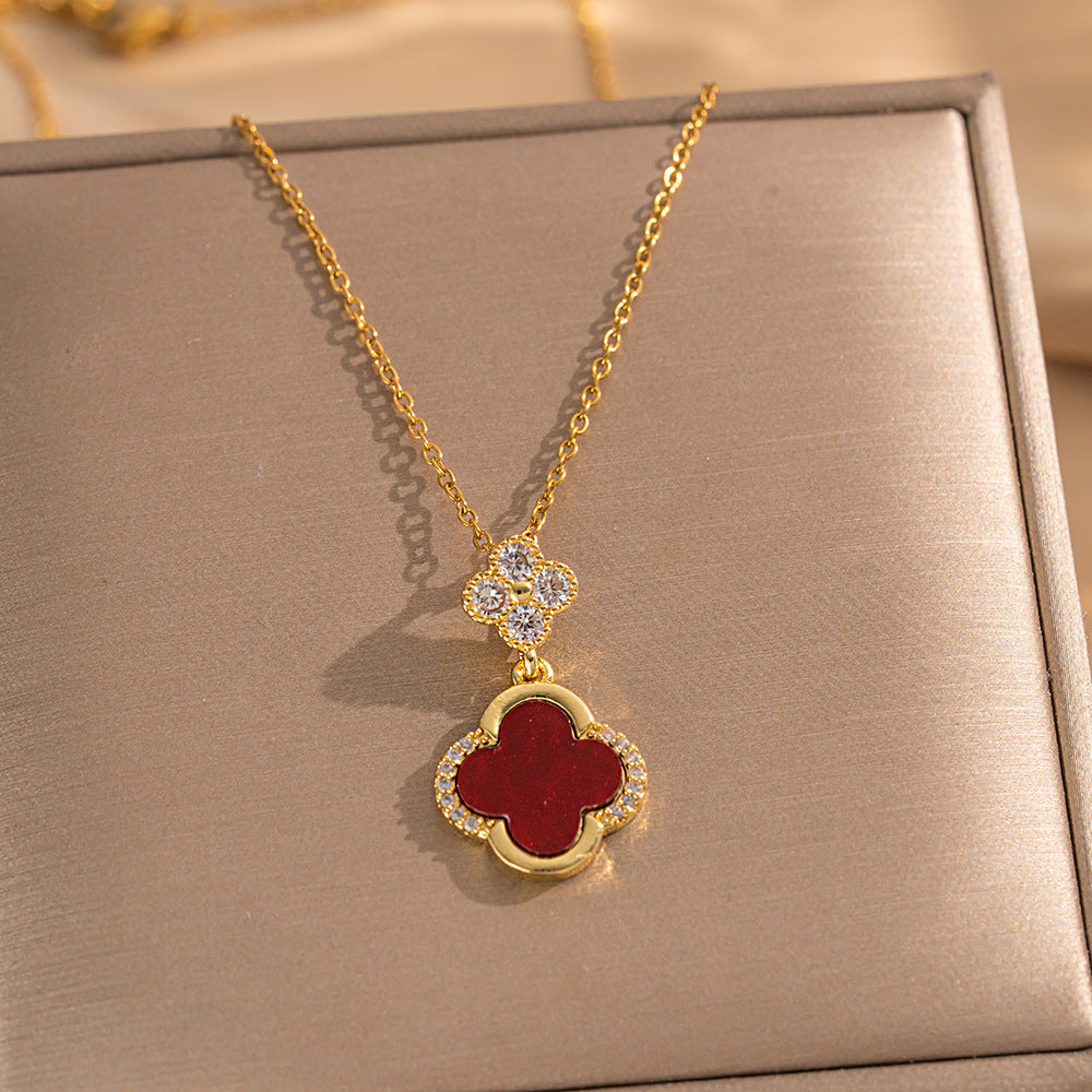 Set collana e orecchini da donna di lusso a forma di trifoglio in acciaio al titanio con intarsi in oro su catena a O