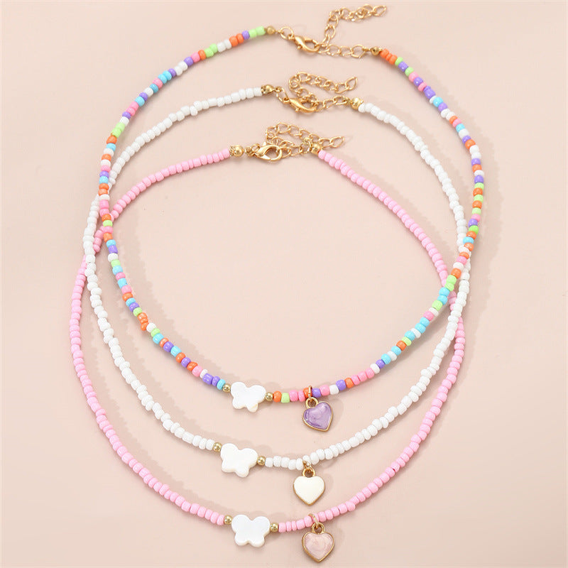 Collana con Ciondolo a Farfalla Smaltata in Stile Bohemien con Perle di Vetro per Bambini, Catenina con Perline Rotonde Fatta a Mano
