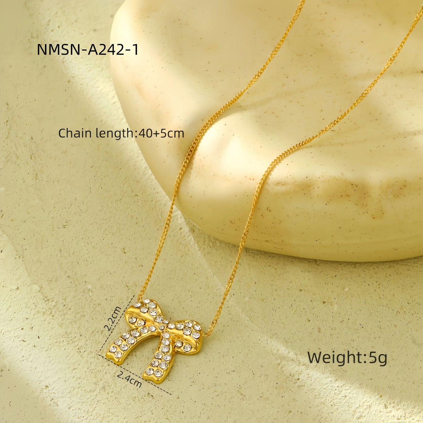 Orecchini di lusso da donna in acciaio al titanio a forma di fiocco con intarsio di strass completo e finitura placcata