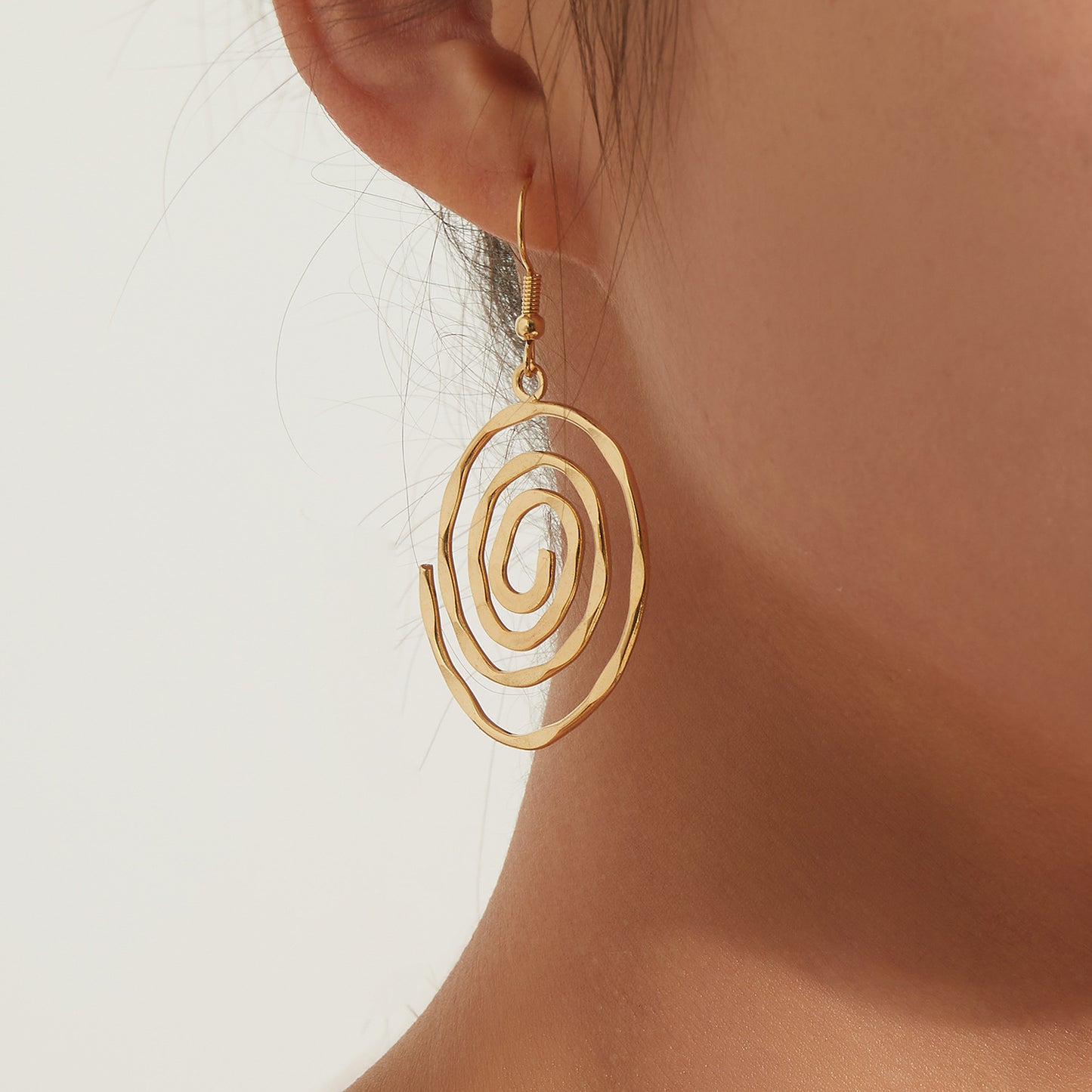 Fashionable Hollow Circular Spiral Earrings for Women in Alloy with Plated Finish