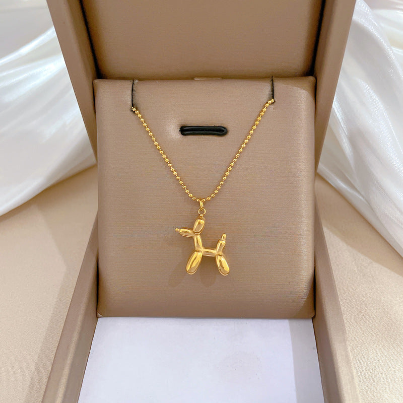 Collana con Ciondolo a Cane Geometrico Minimalista in Acciaio al Titanio per Donna e Uomo con Finitura Placcata Oro e Design a Catena Clavicolare