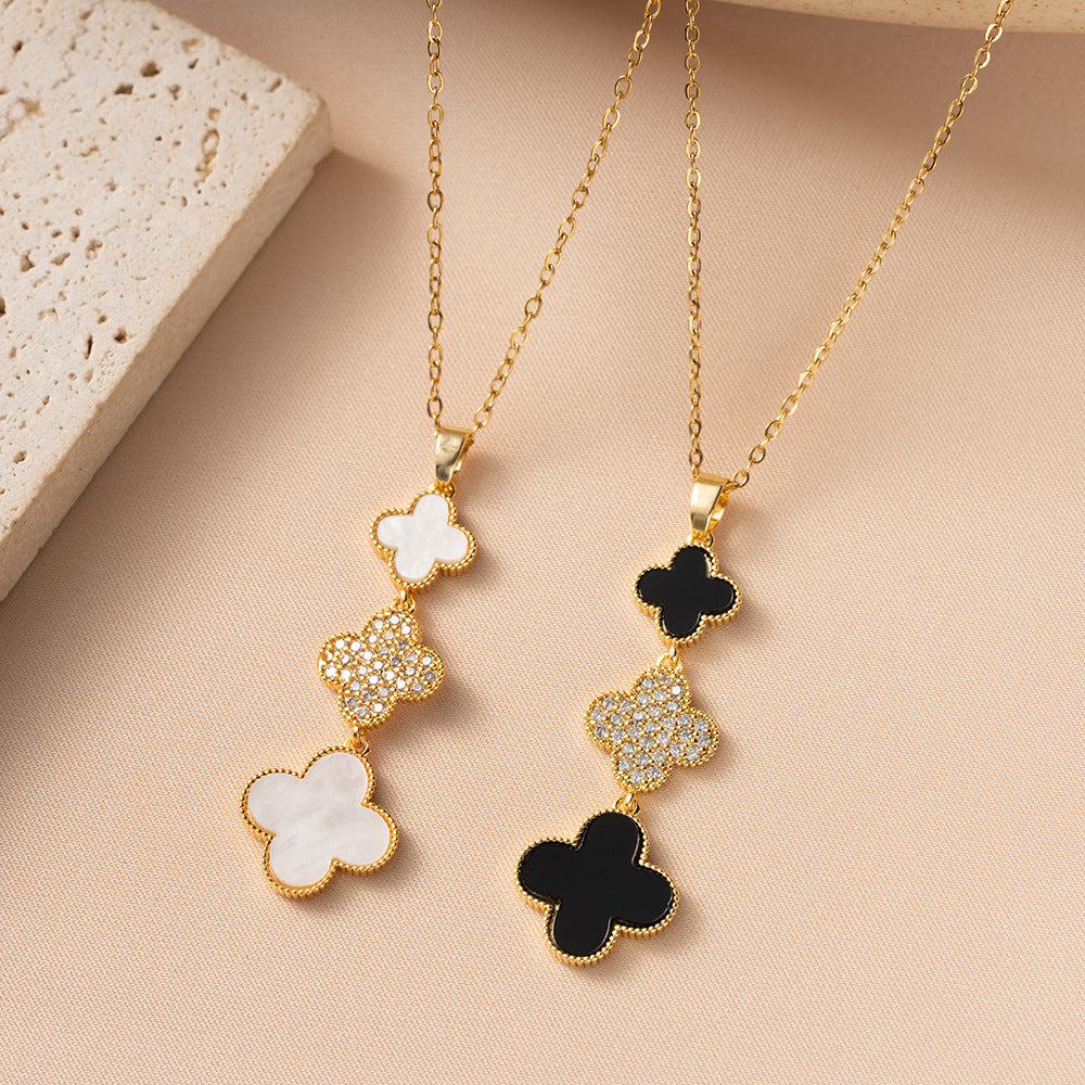 Collar minimalista con colgante de trébol de cuatro hojas en acero de titanio con chapado en oro en cadena O para mujer