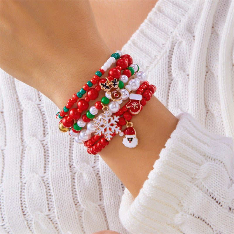 Bracciale Elastico Natalizio alla Moda con Perline in Lega e Ciondoli a Forma di Fiocco di Neve, Renna e Babbo Natale per Donna