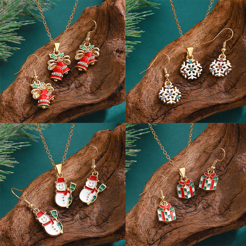 Conjunto de collar y pendientes con temática navideña para mujer, colgante de aleación con motivos de copo de nieve, Papá Noel y campana, joyería festiva minimalista electrochapada