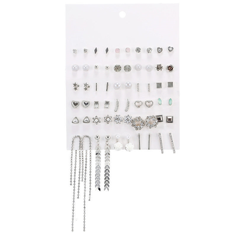 Geometric Asymmetric Micro-inlay Cubic Zirconia and Pearl Titanium Steel Earrings Set with Bow Design