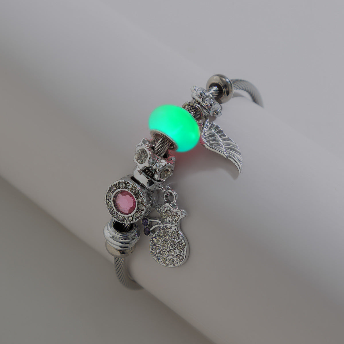 Pulsera geométrica de aleación con diseño floral rústico, dijes de ojos que brillan en la oscuridad y acabado antiguo
