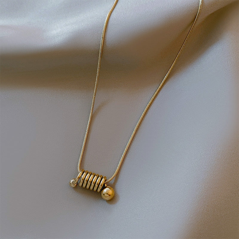 Minimalist Golden Titanium Steel Spiral Snake Chain Necklace for Women with Geometric Design and Clean Aesthetic