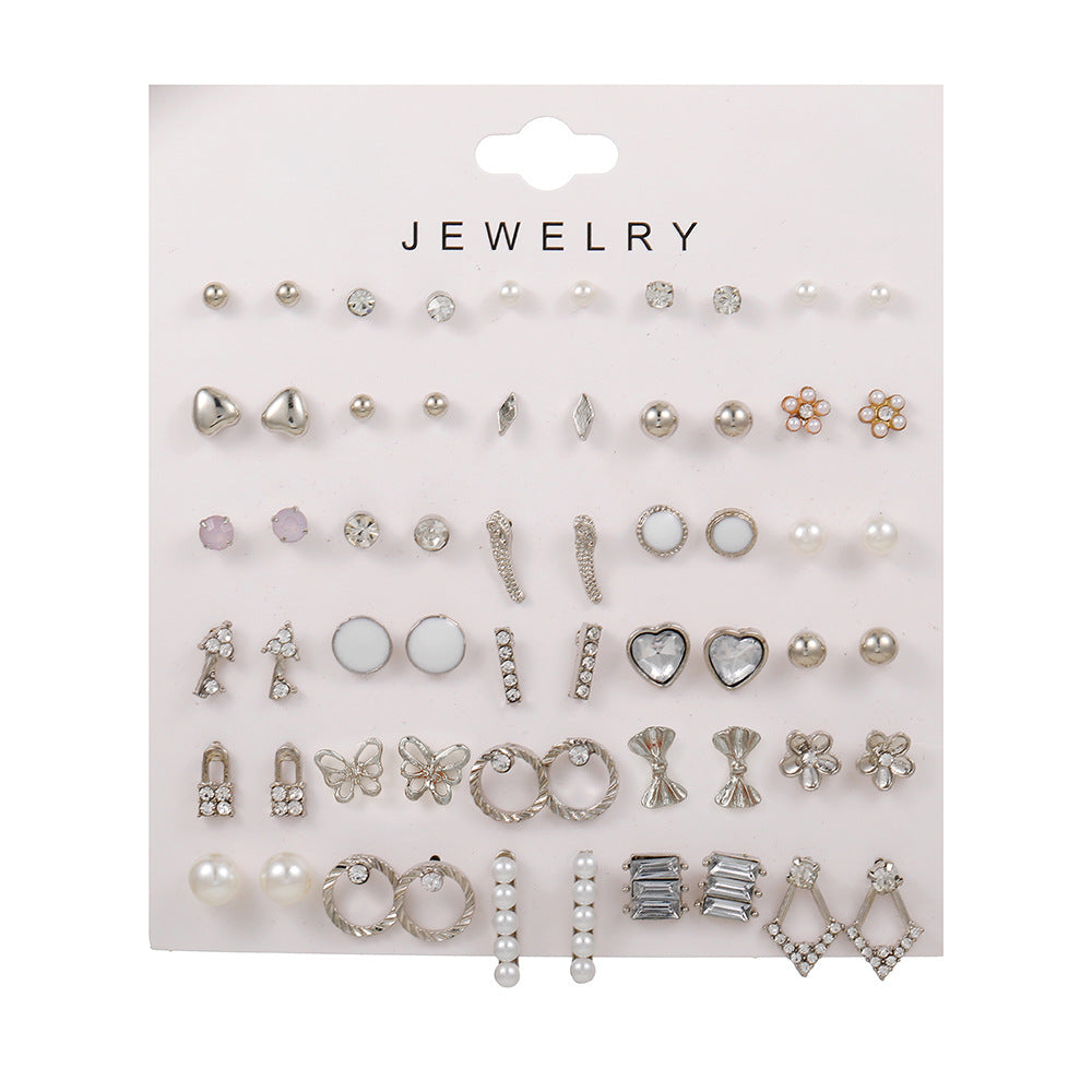 Geometric Asymmetric Micro-inlay Cubic Zirconia and Pearl Titanium Steel Earrings Set with Bow Design