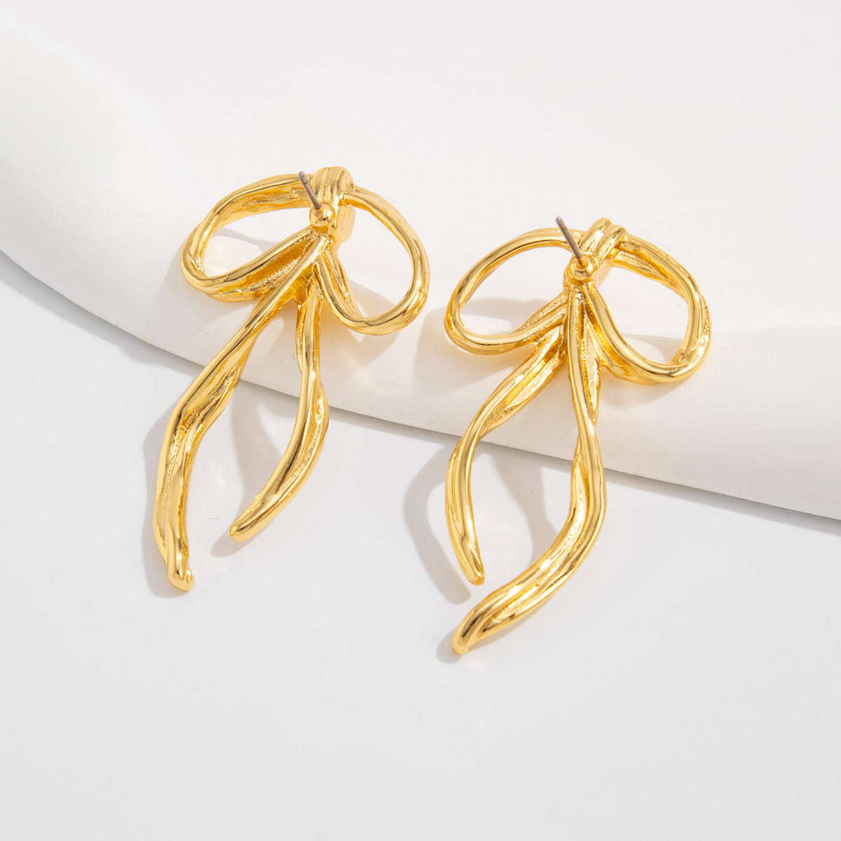 Minimalist Bow-Shaped Alloy Stud Earrings for Women with Electroplated Finish and Stainless Steel Posts
