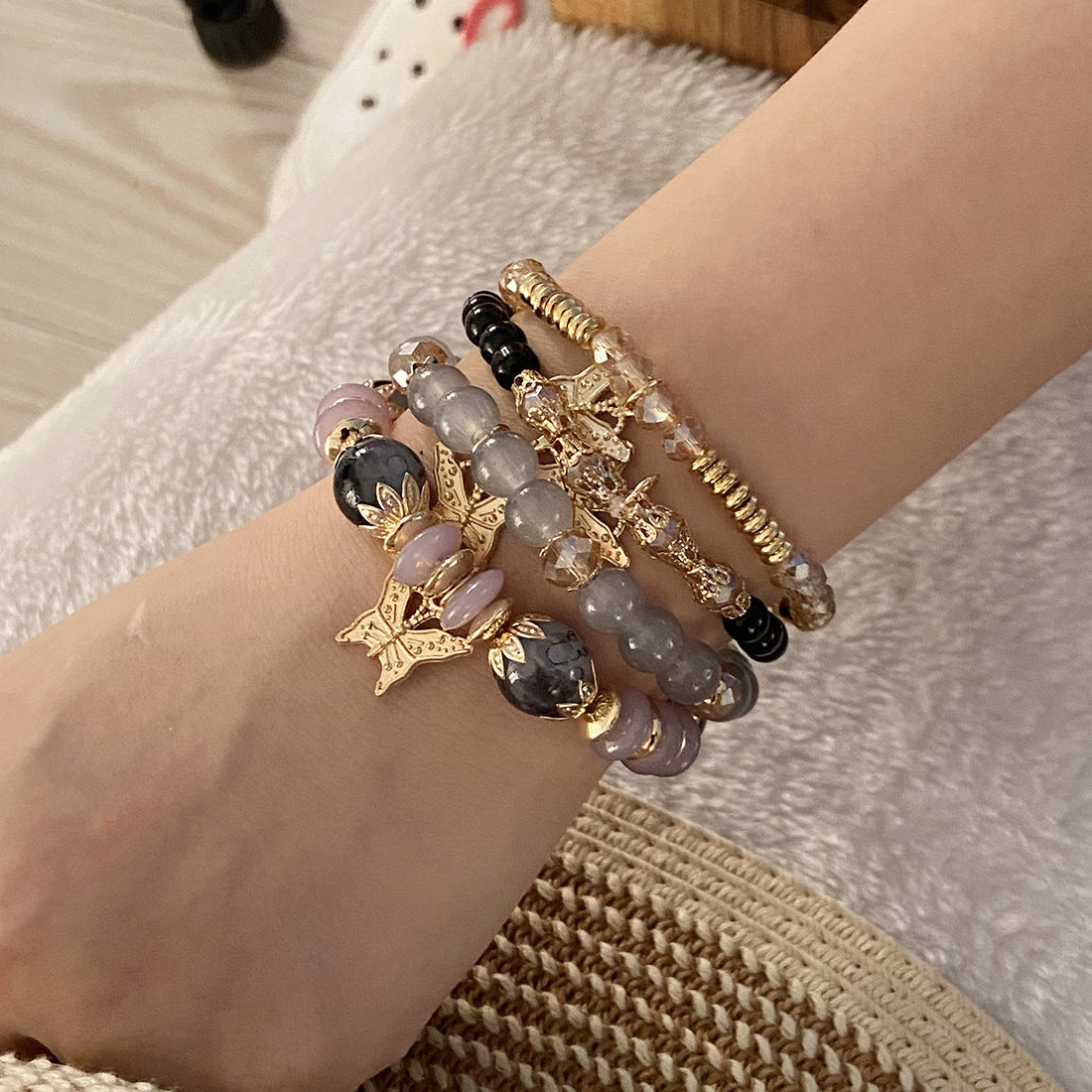 Set di braccialetti bohémien con perline a farfalla in argilla polimerica con finitura artigianale da donna
