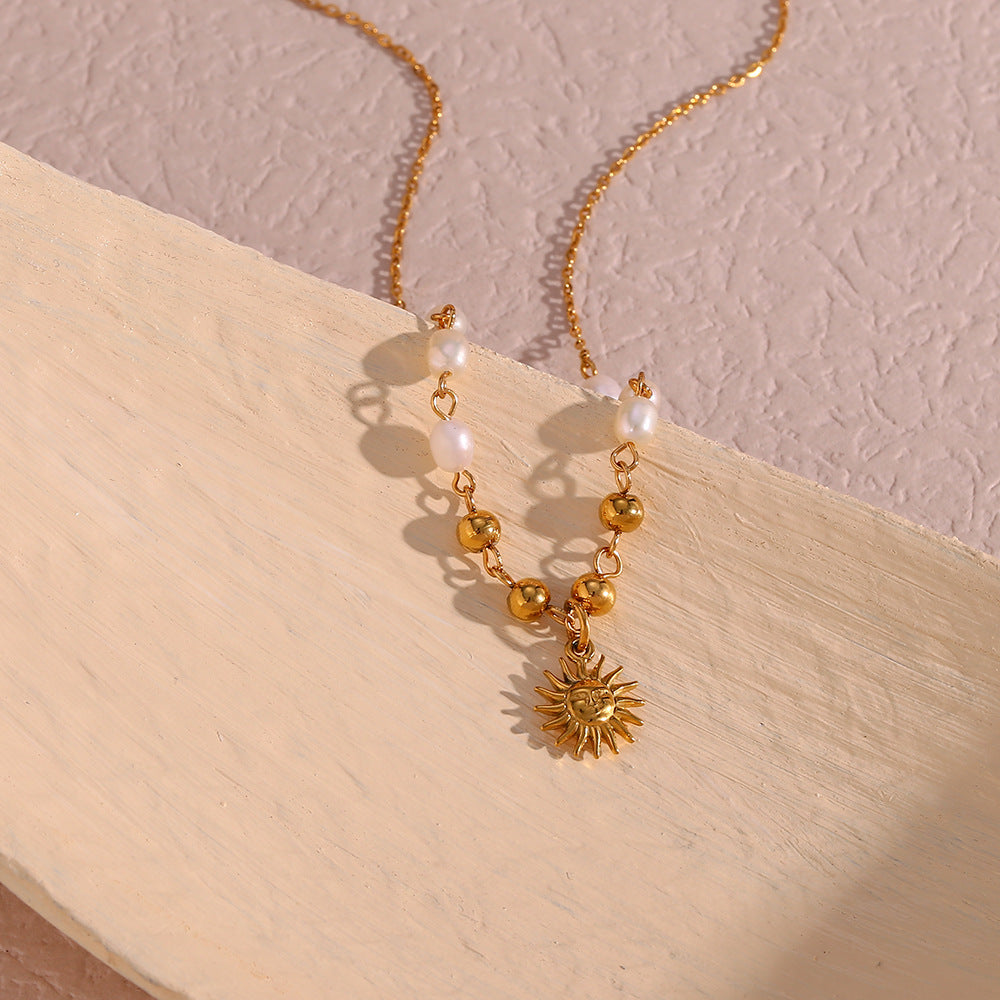 Minimalist Sun-Shaped Pendant Necklace in Stainless Steel with Gold-Plated Titanium Steel Charm and Freshwater Pearl Accents on Standard Chain
