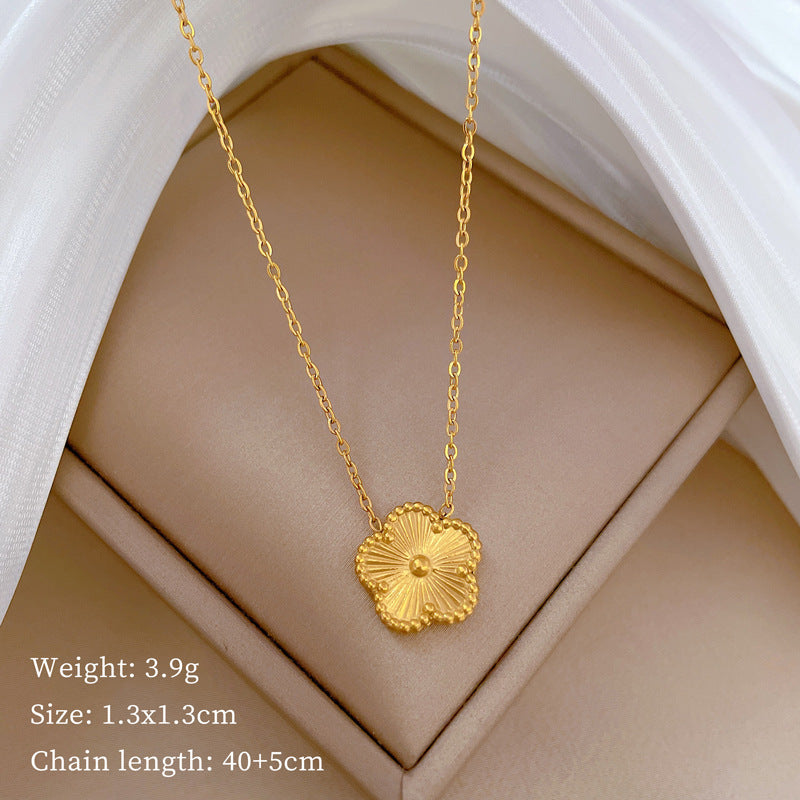 Collana girocollo minimalista unisex in acciaio al titanio con fiore a cinque petali tagliato al laser
