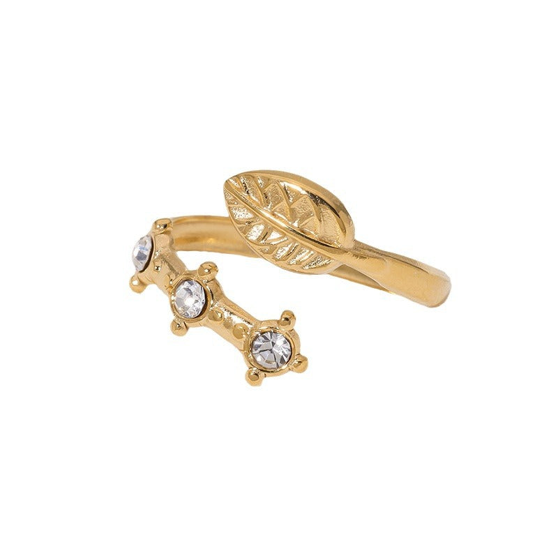 Anillo Minimalista con Diseño de Hoja de Acero de Titanio con Incrustaciones de Pedrería y Baño de Oro de 18K para Mujer