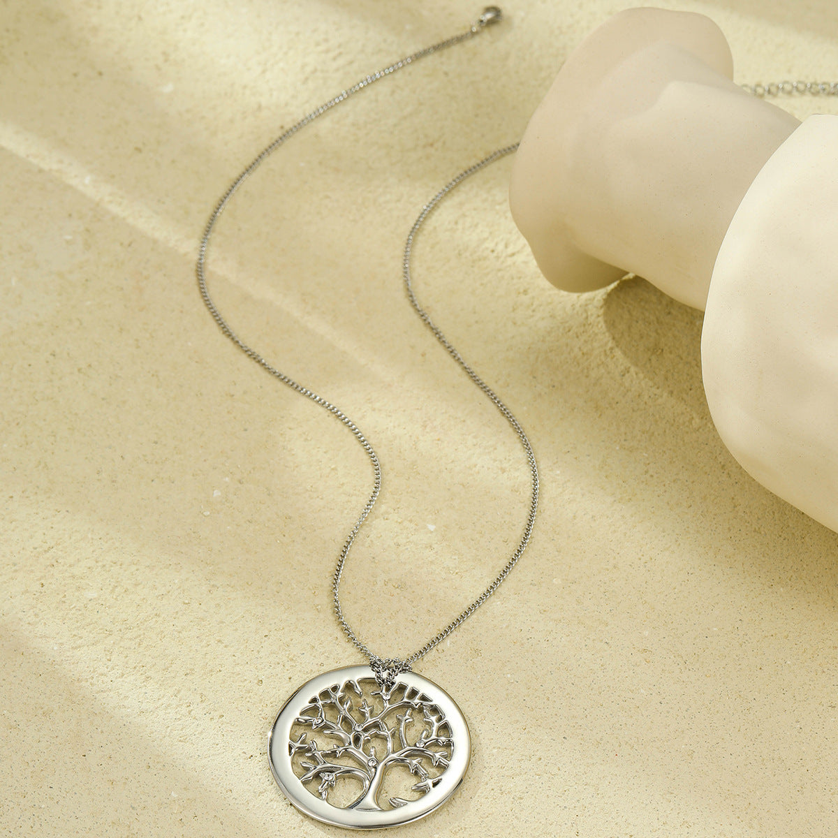 Collana con ciondolo Albero della Vita geometrico minimalista da donna in acciaio al titanio con intarsio in strass e finitura placcata