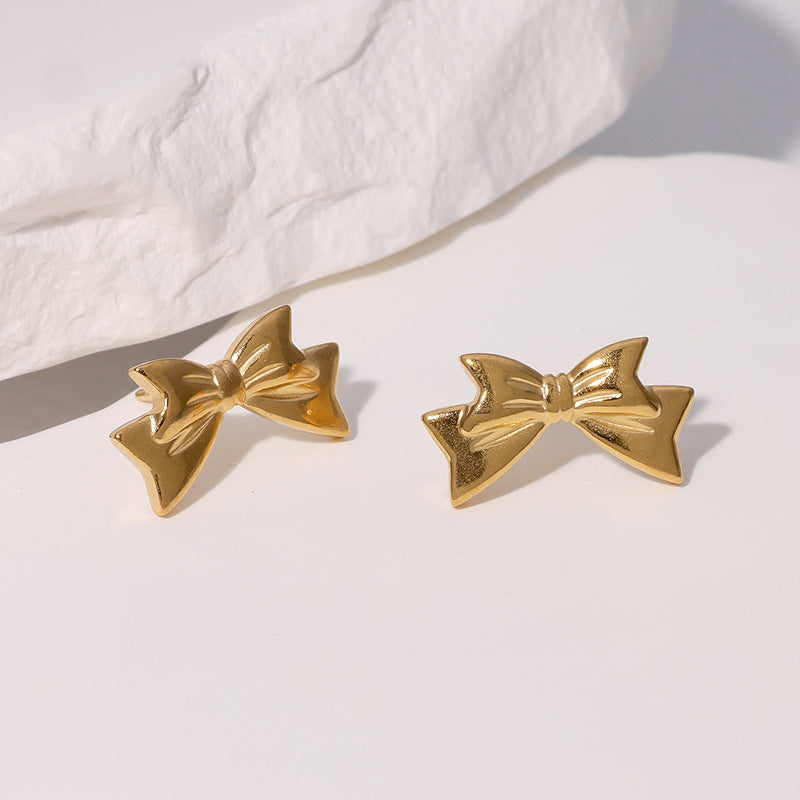 Pendientes de acero inoxidable en forma de lazo de moda minimalista con baño de oro para mujer